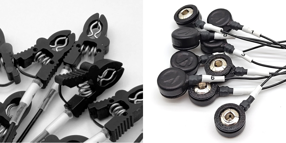 Close-ups of alligator and button clip electrode leads